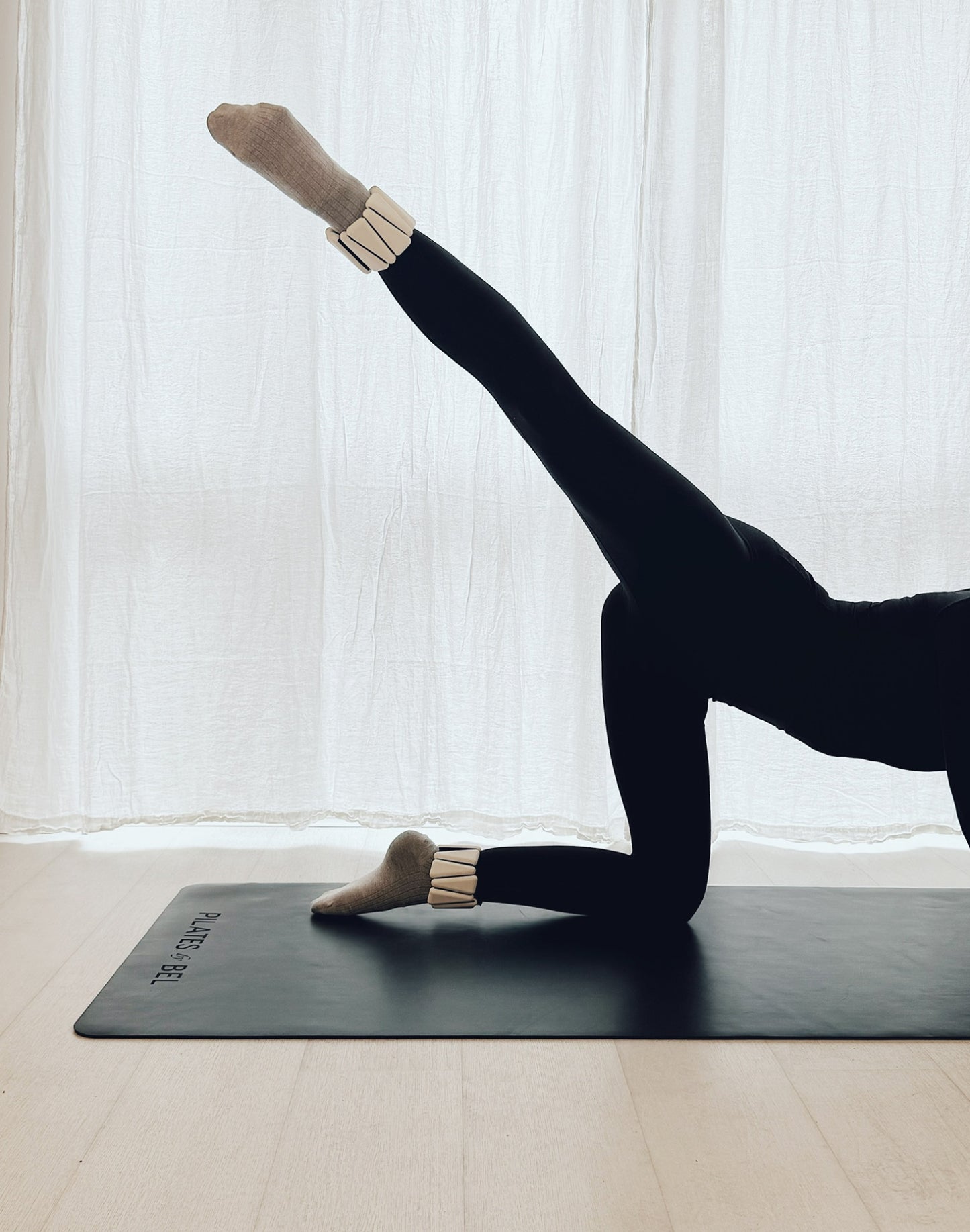 Pilates by bel weights in white used in pilates session